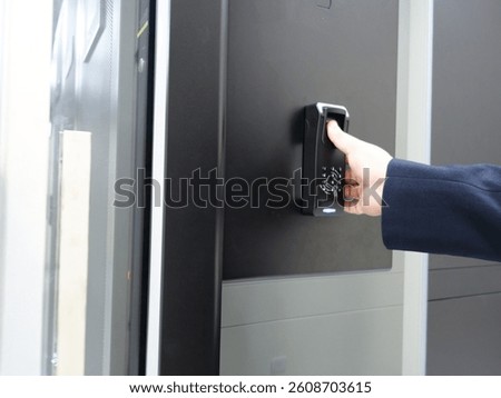 This image showcases a smart lock system featuring a keypad for access control. The modern design emphasizes security and convenience in both residential and commercial settings.
