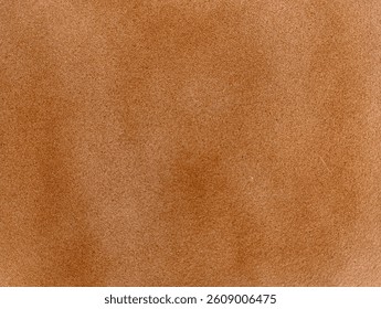 This image shows a close-up texture of light brown suede material. The surface appears soft, slightly fuzzy, and evenly shaded with natural gradients, typical of suede or microfiber fabrics.