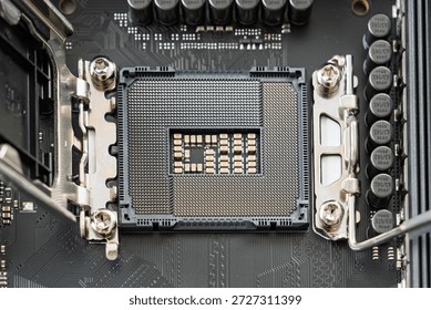 This image shows a close-up view of a CPU socket on a modern motherboard, designed for processor installation, highlighting the advanced technology of computer hardware.