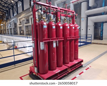 This image shows a CO₂ fire suppression system installed in an industrial facility.