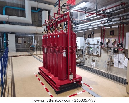 This image shows a CO₂ fire suppression system installed in an industrial facility.