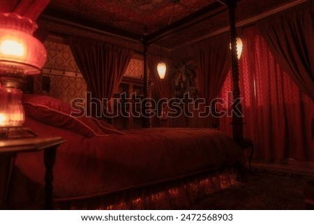 This image shows the interior design of a red victorian, bordello themed bedroom, facing a dramatic the poster bed.