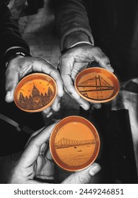 in this image shows three cups of tea and and edit of the popular histprical places of kolkata