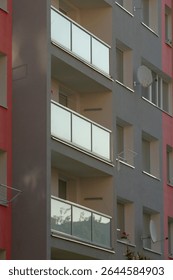 This is an impressive building that features numerous windows and several balconies for the residents to enjoy stunning views