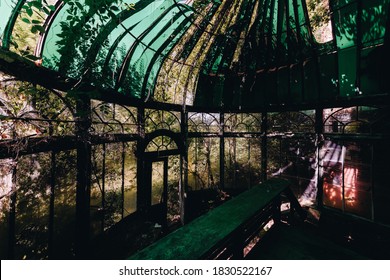 This is an interior view of the conservatory/greenhouse with an opaque green glass covering at the long-abandoned and historic Dunnington Mansion in Farmville, Virginia.