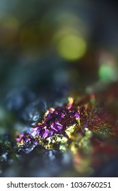 This is iridescent colorful copper ore called peacock ore or chalcopyrite from Virtasalmi copper mine in Finland.  Microscope image.
 - Shutterstock ID 1036760251