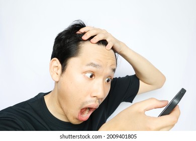 This Japanese man has a large forehead area. - Shutterstock ID 2009401805