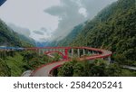 This is a Kelok 9 bridge in Indonesia, West Sumatra, Called Kelok 9, this bridge has 9 bends and is an iconic bridge in West Sumatra