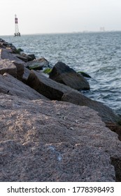 This Is A Landscape Picture Of A Jetty Along The Texas Coast.