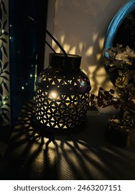 This lantern casts a warm glow of peace and calmness guiding us through the darkness
