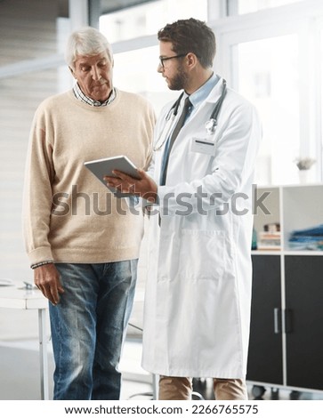 So this link will bring up all your medical history. Cropped shot of a young male doctor showing his senior male patient something on a digital tablet.