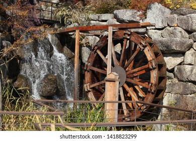 This machine is driven by a water.
It's waterwheel. 
The principle of falling water is to make grain into flour.
It was a very important agricultural machine for Korean farmers long ago.