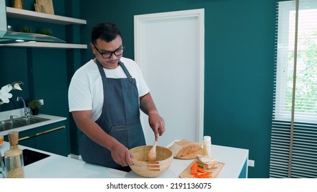 This Man Is Arranging, And Preparing Breakfast For His Lover, Before Leaving The House To Go To Work, Happily In The Kitchen, The Love, And Friendship Of LGBTQ Couples.