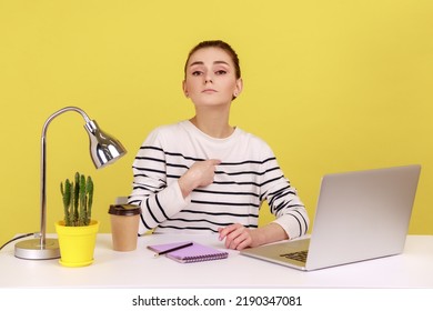 This Is Me. Self Confident Egoistic Woman Office Manager Pointing Herself And Looking At Camera With Arrogant Expression, Working In Office. Indoor Studio Studio Shot Isolated On Yellow Background.