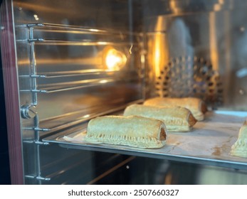 This menu has sausage bread that is baking.