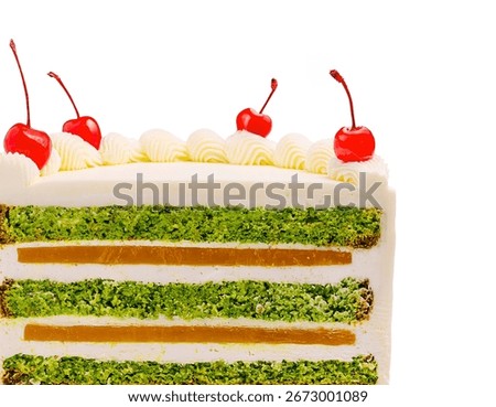 This mouthwatering cake features multiple layers of green filling, creamy frosting, and cherries on top. Perfect for celebrations or dessert lovers seeking something special.