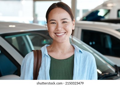 This Is My First Car Purchase. Shot Of A Young Woman About To Purchase A New Car.