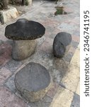 This is not an ordinary stone arrangement, but these stones are arranged and shaped to sit and rest for pedestrians in the Ngawioboro area, Jalan Yos Sudarso Ngawi, East Java