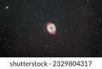 This object, called the Helix nebula, lies 650 light-years away, in the constellation of Aquarius.