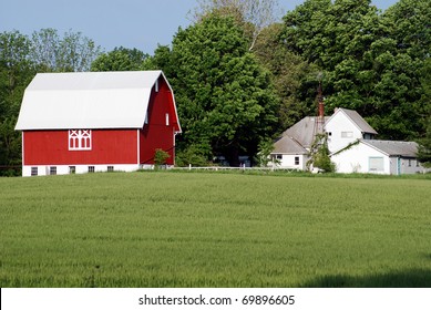 This Is An Old Farm House And Barn Near Eaton Rapids, Michigan. The Buildings Have Been Kept Up But They Are No Longer Occupied By The Farmers Nor Is The Family Still Farming.