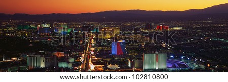This is an older aerial view of the strip showing an overview of the whole Las Vegas area at sunset.