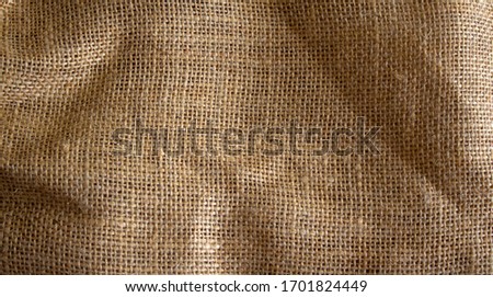 This one has a fairly rough texture. This was once a burlap, woven using goat hair with a dark color. In addition, burlap fabric is also made from jute fiber. You can use this photo as a background