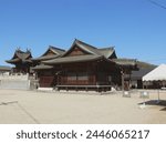 This panoramic image includes both the prayer hall and main hall of the Japanese shrine.
The smaller building on the left is a main hall, where the deity is enshrined.