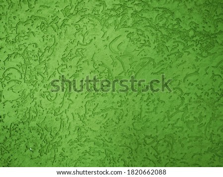 this is a pattern of wall rustic or texture in dark green colour. it looks very beautiful and it give strenth to tha wall