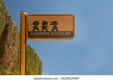 This photo features a street sign that reads "School Route," alerting drivers to the presence of student pedestrians in the area. The sign serves as a precautionary measure, being cautious - Powered by Shutterstock