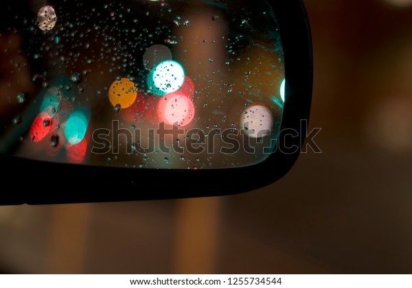 This photo has been taken from
out of the window of my car, I have focused on the surface of the
mirror, this creates a nice, blurred affect in the
reflection.