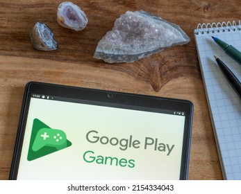 In This Photo Illustration Google Play Games Logo Seen Displayed On A Tablet