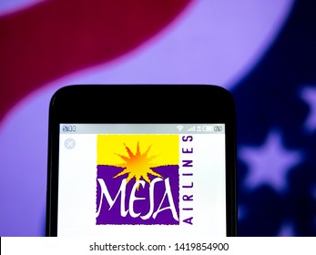 In This Photo Illustration The Mesa Airlines Logo Is Seen Displayed On A Smartphone