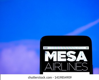 In This Photo Illustration The Mesa Airlines Logo Is Seen Displayed On A Smartphone