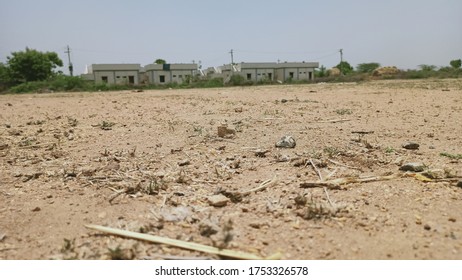 This Is The Photo Of The Low Angle Of The Dry Land With Stones And Sand With Porous Soil