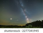 This is a photo of the Milky Way taken on the night of August 13, 2021, in Elk Island National Park, Alberta, Canada. Jupiter, the fifth planet from the Sun, is visible in the lower left.