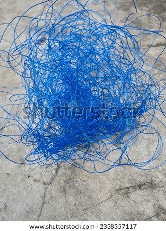 This is a photo of the tangled threads that children usually use to play kites 