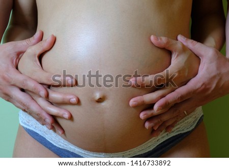 Similar – Image, Stock Photo Top view of hands massaging female abdomen