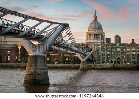This is a picture of  the Millennium Bridge and St Paul's Catherdral in London at sunset