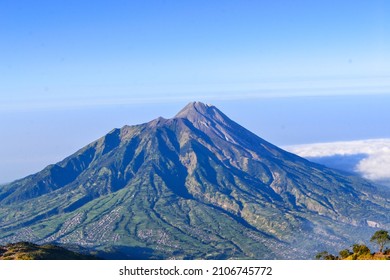This picture is Mount Merapi which is located in Central Java. Mount Merapi is the most active volcano in Indonesia. This picture was taken from the top of Mount Merbabu which is located next to Mount