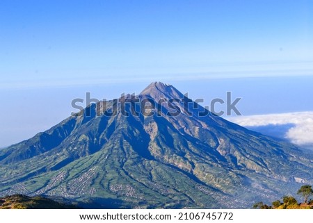 This picture is Mount Merapi which is located in Central Java. Mount Merapi is the most active volcano in Indonesia. This picture was taken from the top of Mount Merbabu which is located next to Mount