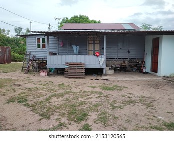 This Picture Shows Old House In Malaysian Village. 