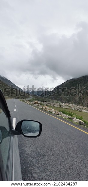 This is a picture of snow capped mountains. In
this photo a car, road and snowy mountains can be seen. This
beautiful view is a heaven to eyes.
