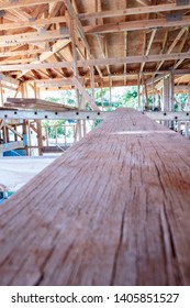 This Is A Picture Of A Spring Home Renovation.  Walk The Plank To Scaffolding And Be Able To Reach The Framing. These Walls Still Need Dry Wall And Finishing.