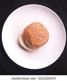 This Is A Plain Burger Bun That Has Not Been Topped Or Stuffed.