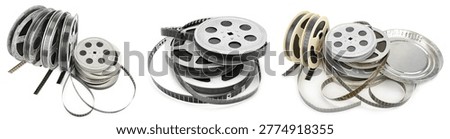 This professional set features multiple vintage film reels and loose celluloid strips isolated on a clean white background. It is perfect for cinema history and retro media projects.