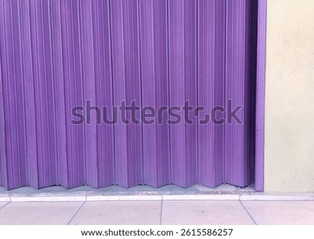 This rolling door has a unique color so it is good as a background image