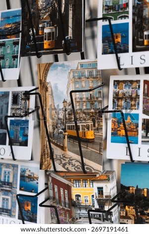 This scene features an assortment of postcards displaying Lisbon's charming architecture, scenic tram lines, and beautiful urban views, capturing its unique atmosphere and culture.
