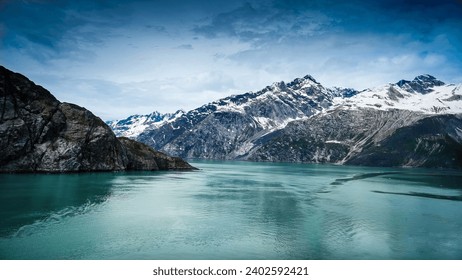 This scenic landscape shows a majestic mountain range in Glacier Bay National Park. Alaska, USA.