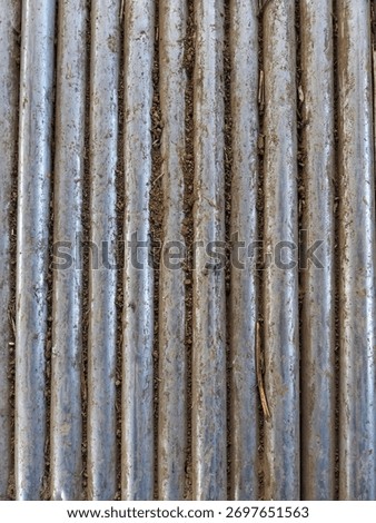 This is a section of the bridge made from a series of iron pipes.
