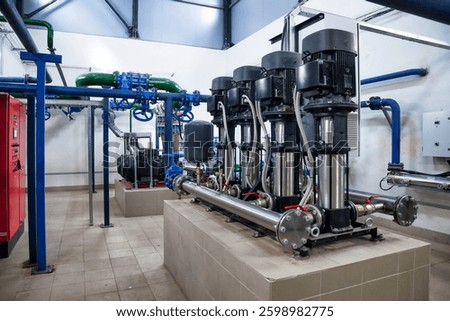 This setup features multiple high-capacity pumps arranged in a clean, well-organized layout, optimizing water flow within an industrial space. Colorful pipes enhance functionality and safety.